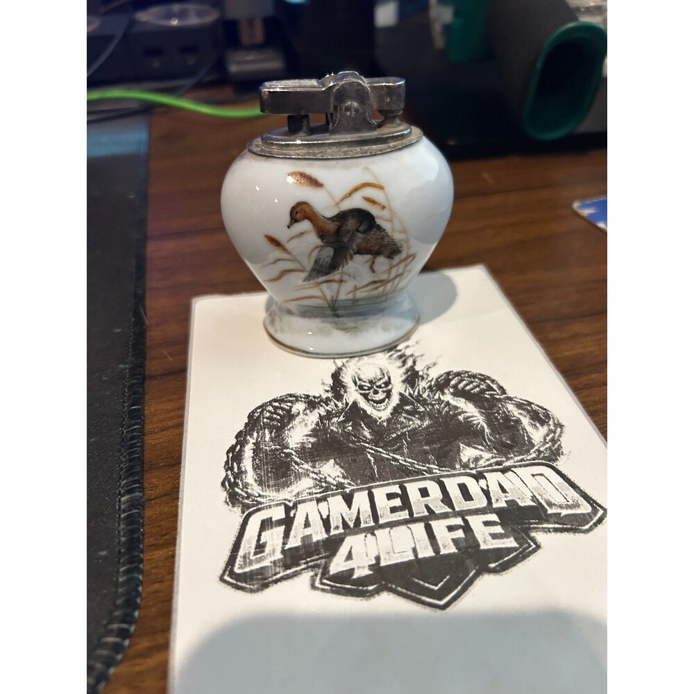 ATC Super DeLuxe Automatic Tabletop Lighter with flying duck design